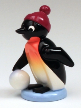 Pinguin mit Schneekugel