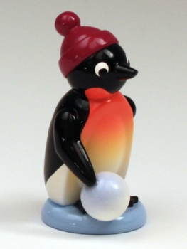 Pinguin mit Schneekugel