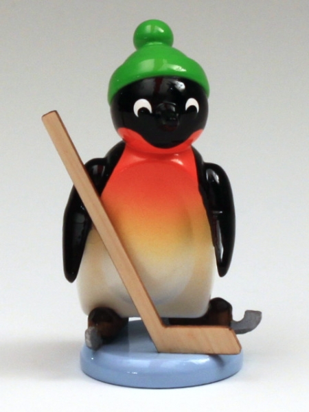 Pinguin mit Eishockeyschläger
